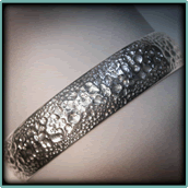 Sterling Silver Carved Synclastic Cuff.
